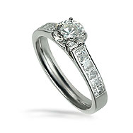 Round Solitaire With Princess Channel Engagement Ring